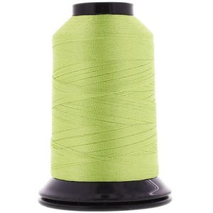 May include: A spool of light green thread with a black plastic bobbin.