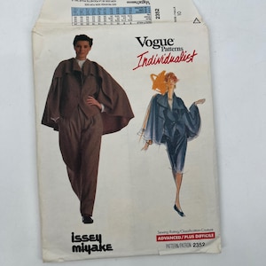 May include: Vogue Patterns Individualist sewing pattern featuring Issey Miyake designs. The pattern envelope shows two fashion illustrations of a cape and suit. The envelope is white with red and black text.