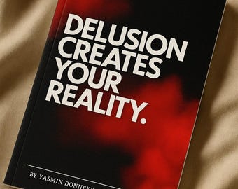 May include: A book with a black cover and the title "DELUSION CREATES YOUR REALITY" in white text. The background has a red and black abstract design. The author's name, Yasmin Donneky, is printed at the bottom.