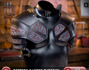 May include: Black leather shoulder armor with intricate red and blue detailing. The armor is worn on a mannequin and has a pattern and video tutorial available for download.