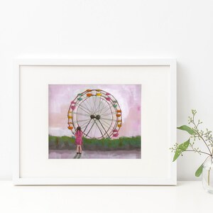 May include: A painting of a girl standing in front of a large Ferris wheel. The Ferris wheel is painted in shades of pink, green, yellow, and orange. The background is a soft pink and purple.