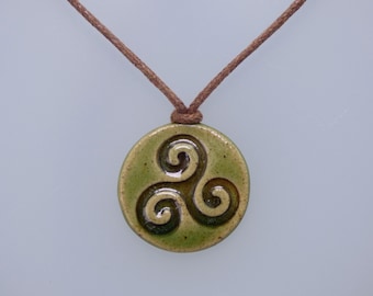 Handmade Ceramic Triskele Celtic Pendant Necklace – with veggie cord