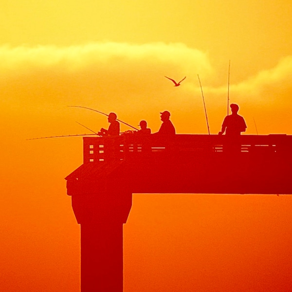 A photo of People fishing on top of a pier digital download
