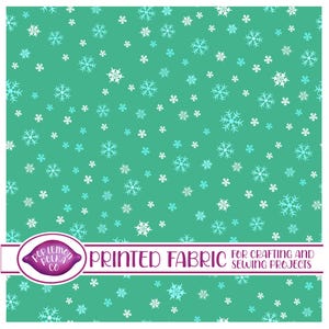 Printed Sewing Fabric For Crafting, Quilting And Dressmaking. Design - Snowflakes on Green