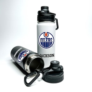 Nom personnalisé Nom personnalisé American Pro Hockey Nom de la bouteille d&#39;eau de sport hydrophobe isolée en acier inoxydable de 18/32 oz qui garde le froid pendant 24 heures