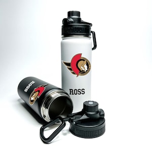 Nom personnalisé Nom personnalisé American Pro Hockey Nom de la bouteille d&#39;eau de sport hydrophobe isolée en acier inoxydable de 18/32 oz qui garde le froid pendant 24 heures