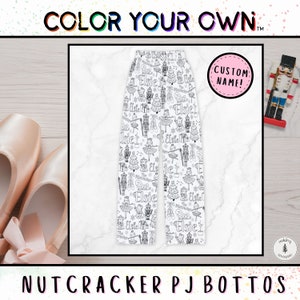 May include: Color your own white pajama pants with a black and white print of nutcrackers, ballerinas, and Christmas trees. The pants have the name "Elsie" repeated throughout the print. The text "COLOR YOUR OWN" and "CUSTOM NAME!" are at the top of the image.