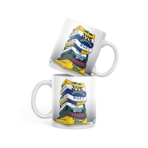 May include: A set of three ceramic mugs with a speckled, matte finish in cream, light grey, and dark grey. Each mug has a simple, minimalist design, ideal for coffee or tea.