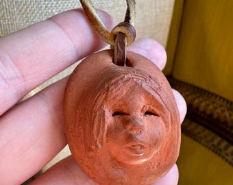 1970's Ann Entis American Folk Art Terra Cotta Little Girl Face Pottery Pendant Necklace