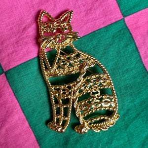 1980’s AJC Unchained Meow-lody Glam Gold Cat Brooch