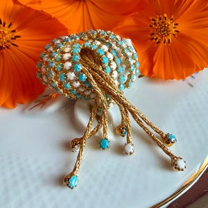 Spectacular 1950's Blue Opaline and Milk Glass Pavé Bright Gold Tassel Drop Brooch
