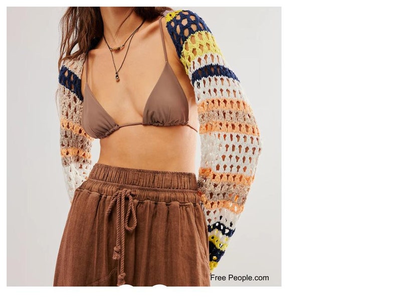 Free People Gia Shrug - make your own with this crochet pattern. This shrug / bolero pattern is for beginners and can be made in a weekend. This shrug / bolero is great for the spring or as a beach shrug during the summer.