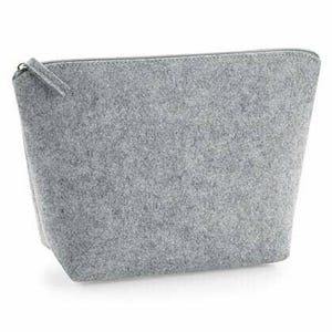 May include: A gray felt zippered pouch. The pouch is rectangular with a trapezoidal shape, wider at the base and tapering towards the top. The zipper pull is a small tab of the same gray felt material.