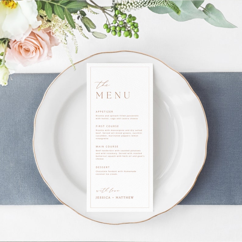 Editable wedding dinner menu template in a modern minimalist style featuring a warm marigold accent. Displayed as a printable wedding menu on a stylish reception table. Ideal for couples seeking coordinated wedding stationery, simple customization, and a clean digital download design.