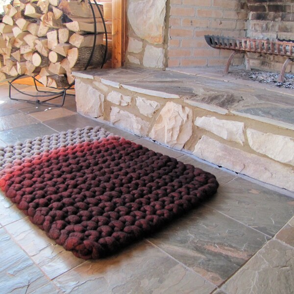 Hand knit extra thick wool felt natural roving dip dyed rug in gray and crimson red