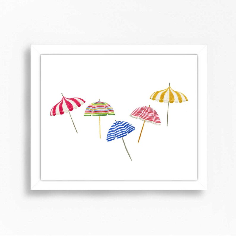 May include: Watercolor print of several beach umbrellas in various colors and patterns, including red and white stripes, green and yellow stripes, and blue and white stripes. The umbrellas are set against a white background.