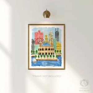 May include: A watercolor print featuring a city skyline with a prominent domed building in the foreground, a red ferris wheel, and various skyscrapers in shades of red, yellow, and blue, all set against a blue water background with a small sailboat.