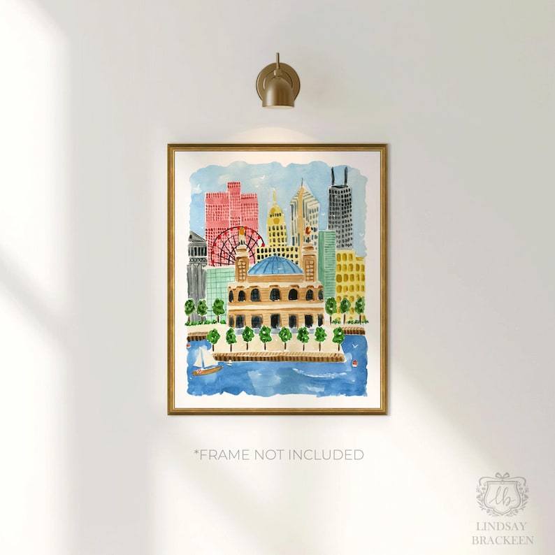 May include: A watercolor print featuring a city skyline with a prominent domed building in the foreground, a red ferris wheel, and various skyscrapers in shades of red, yellow, and blue, all set against a blue water background with a small sailboat.