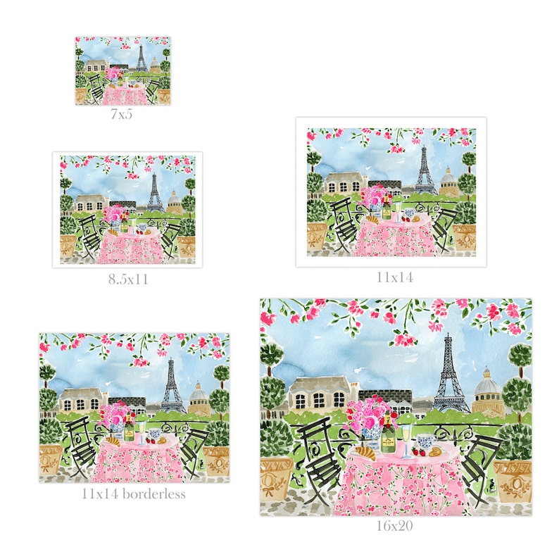 May include: A watercolor painting of a Parisian cafe scene with a pink tablecloth, two chairs, and a view of the Eiffel Tower. The cafe is decorated with pink flowers and greenery.