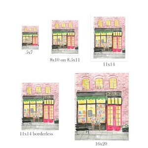 May include: Watercolor print of a bookstore facade. The building has a red brick exterior, green awning, and large windows displaying books. The shop's name, "BOOKS", is above the entrance. Various print sizes are shown, including 5x7, 8x10, 11x14, and 16x20.