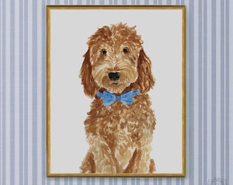 May include: A watercolor painting of a golden-brown curly-haired dog wearing a bright blue bow tie. The dog is centered against a light gray background, and the entire artwork is enclosed within a thin, metallic gold-colored rectangular frame.