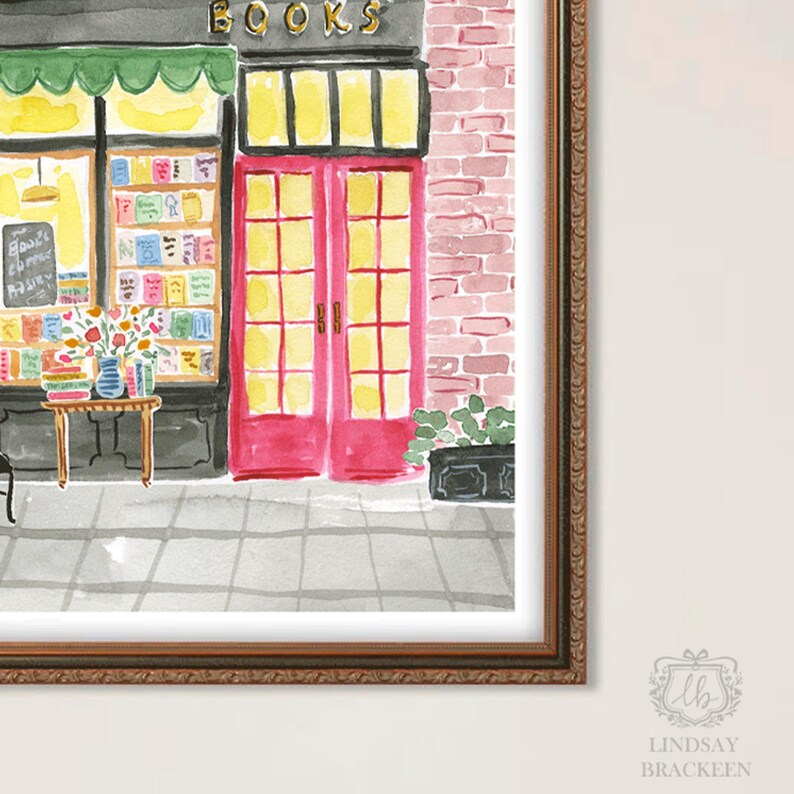 May include: Watercolor painting of a bookstore exterior. The storefront features a green awning, large windows displaying books, and bright red double doors. The word "BOOKS" is above the entrance. A small table holds flowers and books.