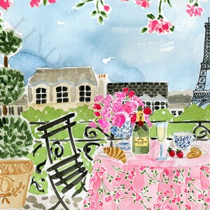 May include: A watercolor painting of a Parisian balcony scene with a pink tablecloth, a bottle of champagne, a glass of champagne, a croissant, and a bouquet of pink flowers. The Eiffel Tower is visible in the background.