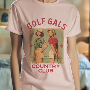 ゴルフギャルズカントリークラブ半袖Tシャツ、レディースゴルフシャツ、女の子ゴルファーへのギフト、ゴルファーへのギフト、かわいいレトログラフィックシャツ、レディゴルフ