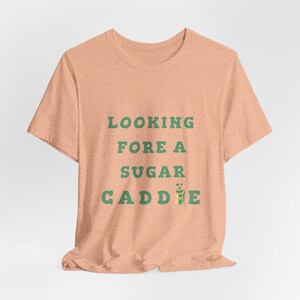 Looking Fore A Sugar Caddie T-shirt, Womens Funny Golf Shirt, Cute Comfy Golfer Tee, Ladies Golf Shirt, Womens Golf, Caddy, Sugar Daddy Golf Heather Peach