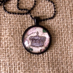 A  Pendant Crown Collage One Inch Domed Glass Black Setting and 24&quot; Chain