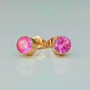 AAA-klassad rosa safir med 14k guldfylld bezelinfattning. Labbodlade ädelstenar