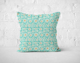 Scandinavian style floral throw pillow in turquoise cream and orange