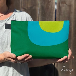 Retro cosmetics bag. A green and blue makeup bag with mid century, abstract print for cosmetics, toiletries, or accessories. Travel set image 5