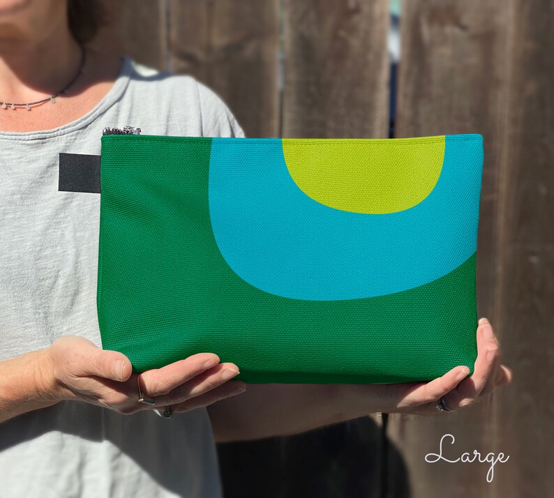 Retro cosmetics bag. A green and blue makeup bag with mid century, abstract print for cosmetics, toiletries, or accessories. Travel set image 5