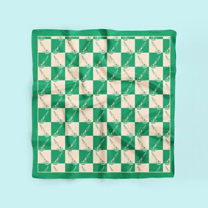 May include: A green and beige checkered bandana with a repeating pattern of a stylised wave design.