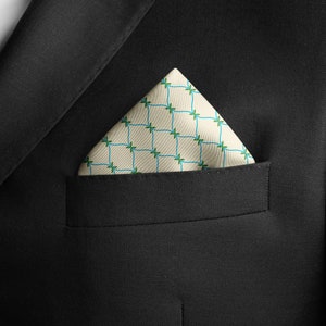 Men&#39;s silk pocket square with blue and green ribbon design. Wear as a neckerchief or ascot for formal occasions and dressing up.