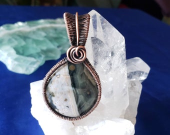 Wirewrapped Ocean Jasper Cabochon Copper Bezel pendant. Oxidized