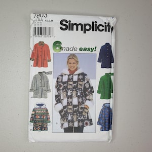 May include: A Simplicity sewing pattern envelope 7803 for a hooded jacket with various style options. The white package features the text 6 made easy! and displays illustrations of jackets in red, green, blue, and patterned fabrics.