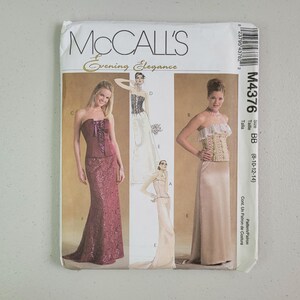 May include: McCall's Evening Elegance sewing pattern M4376, size BB (8-10-12-14). The envelope features illustrations of strapless corset-style bodices paired with long skirts in various colors, including a deep red lace gown and a beige satin skirt.