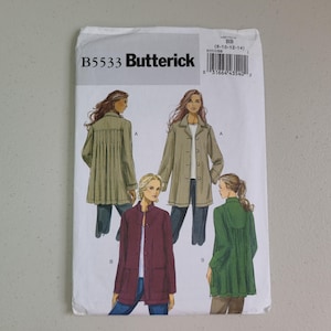 May include: Butterick sewing pattern B5533 for jackets in sizes 8-10-12-14. The envelope features illustrations of two jacket styles: a tan jacket with a pleated back and a button-front jacket in solid maroon or green with pockets.