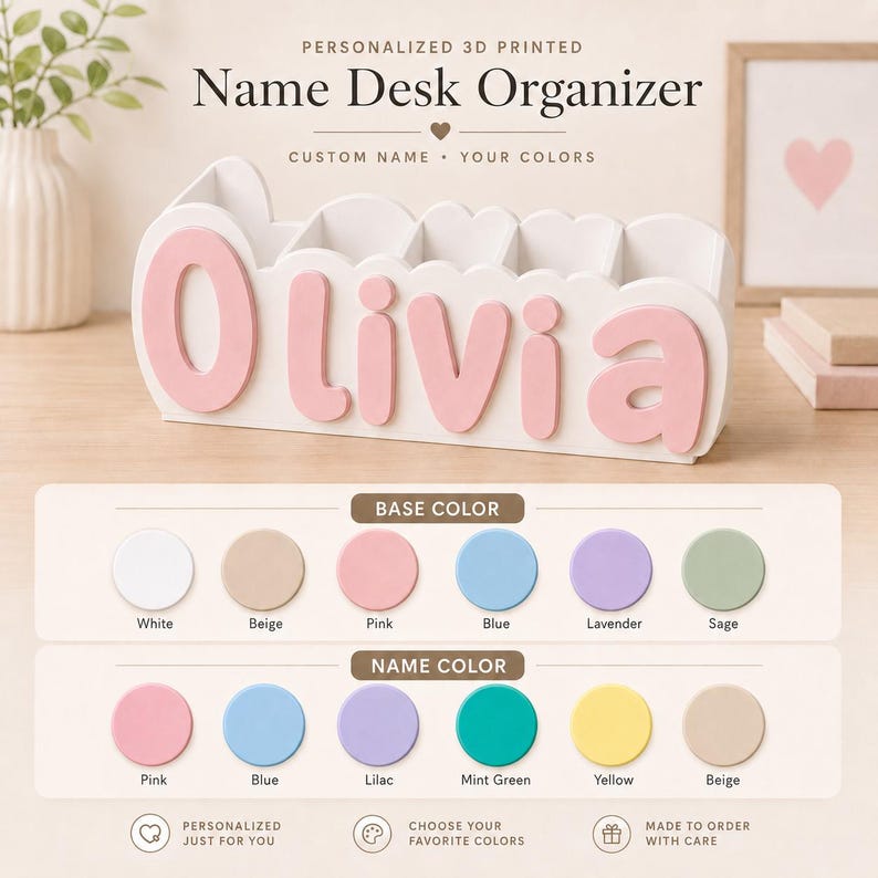 Peut inclure: Un organisateur de bureau imprim&eacute; en 3D blanc avec le pr&eacute;nom Olivia en lettres roses en relief. L'organisateur poss&egrave;de plusieurs compartiments et un bord sup&eacute;rieur festonn&eacute;. Un nuancier pr&eacute;sente les couleurs de base et de lettres.