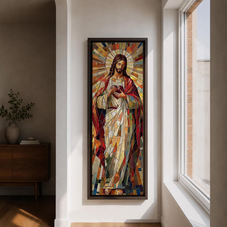 Long vertical stained glass style painting of Jesus Christ holding the Sacred Heart at his chest while radiant golden rays form a halo behind him. The figure is composed of colorful mosaic glass segments in red gold blue and white creating a luminous Christian devotional composition.