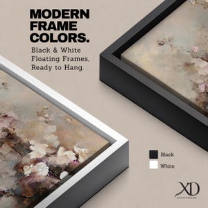 Puede incluir: Dos obras de arte en lienzo enmarcadas, una con marco blanco y otra con marco negro. La obra de arte presenta un dise&ntilde;o floral con tonos neutros. El texto dice "MODERN FRAME COLORS. Black & White Floating Frames, Ready to Hang."