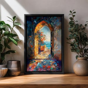 Step through a vibrant Moroccan doorway into a breathtaking coastal escape, where brilliant blue waters and warm Mediterranean light meet expressive impressionist textures. Rich palette knife details and bold jewel tones make this colorful wall art a stunning focal point for boho, coastal, and Mediterranean-inspired interiors.