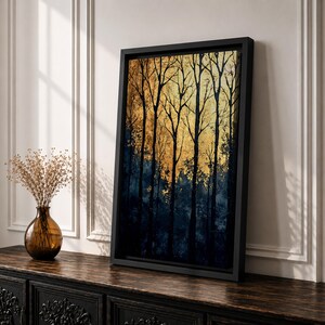 A framed vintage-style artwork depicting tall, bare trees in a forest with a textured golden background. The composition highlights the silhouette of woodland trees against a warm, aged backdrop, blending natural landscape elements with a nostalgic vintage aesthetic.
