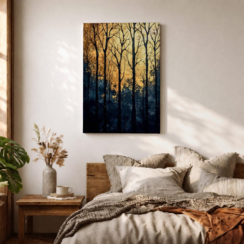 A framed vintage-style artwork depicting tall, bare trees in a forest with a textured golden background. The composition highlights the silhouette of woodland trees against a warm, aged backdrop, blending natural landscape elements with a nostalgic vintage aesthetic.