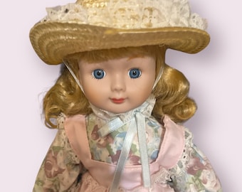 Vintage porcelain doll with stand, with original wrapping