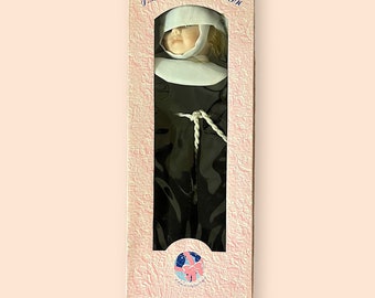 Vintage Nun porcelain doll. Still in unopened packaging.
