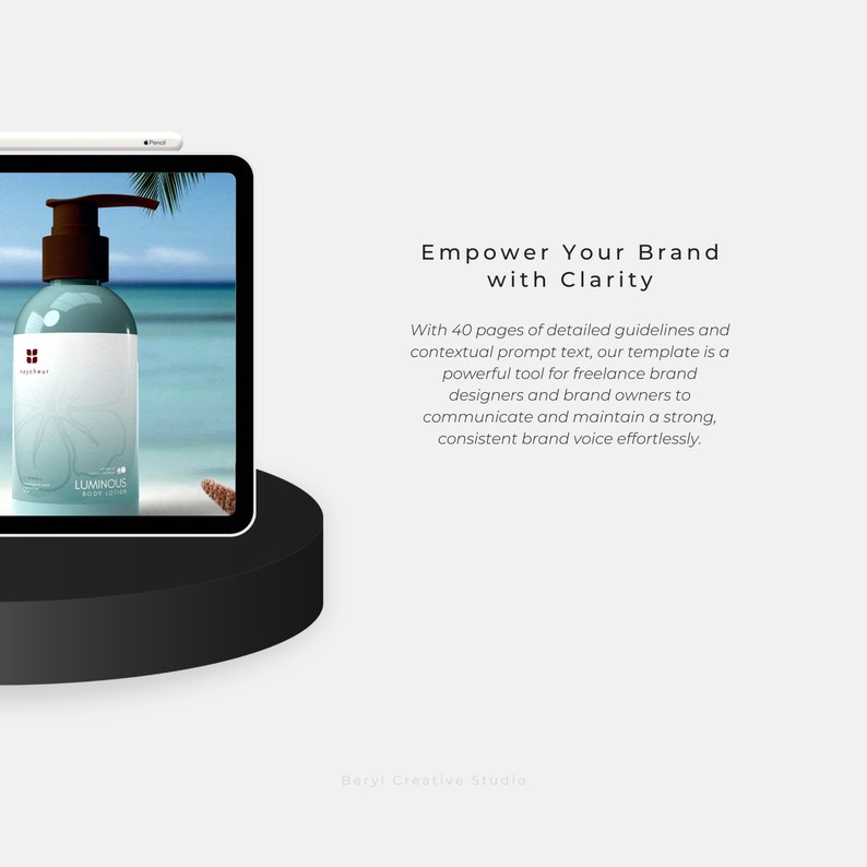 May include: A tablet computer displaying a bottle of body lotion with the text "LUMINOUS BODY LOTION" on the label. The bottle is on a beach with a blue sky and white clouds. The text "Empower Your Brand with Clarity" is displayed on the screen.