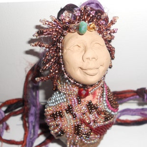 Beadembroidered Pixie Pocket Pal - polyclay face, vintage barkcloth base,silk ribbons